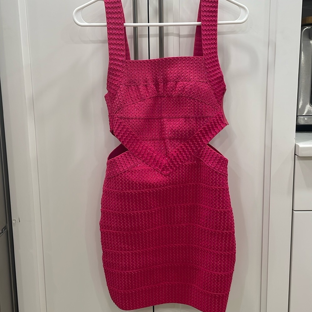 Pink studded dress with cut out hips